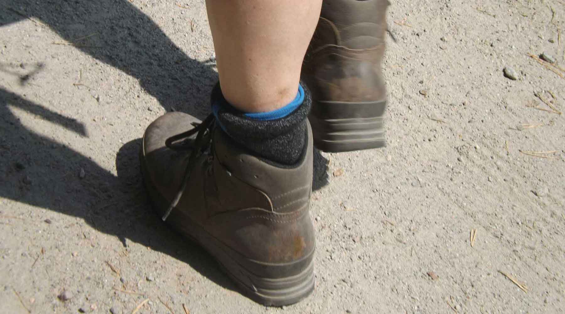 Man wearing hiking boots - ankle high